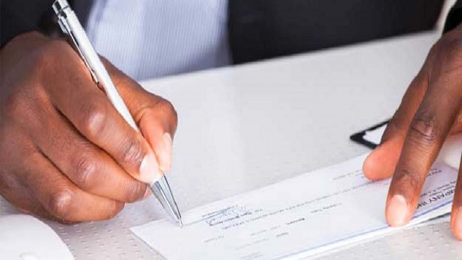Signing a cheque